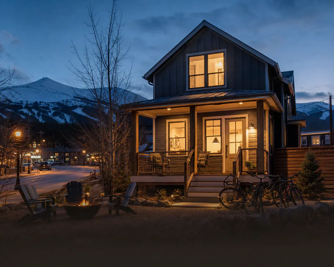 A welcoming short-term rental in a walkable mountain town at blue hour